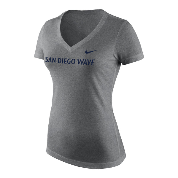 Show off your Wave FC pride with this Nike V-neck t-shirt. The San Diego Wave FC wordmark graphic will ensure everyone knows who you're rooting for on game day.  Tri-Blend fabric Mid V-Neck line Side seamed Rib knit collar Open sleeve hem 50% Polyester / 25% Cotton / 25% Rayon One color screen print on front Dark Heather